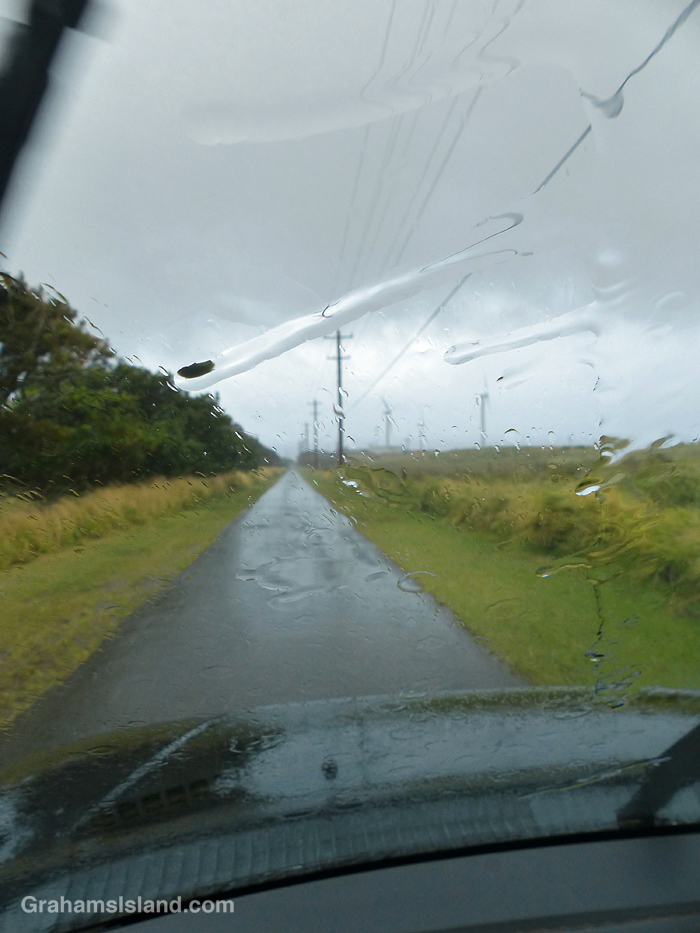 Rain falling in North Kohala, Hawaii, seen through a vehicle windscreen
